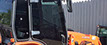 Picture of a Kabota tractor with Window Tinting Installed